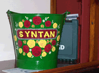 Syntan green tin